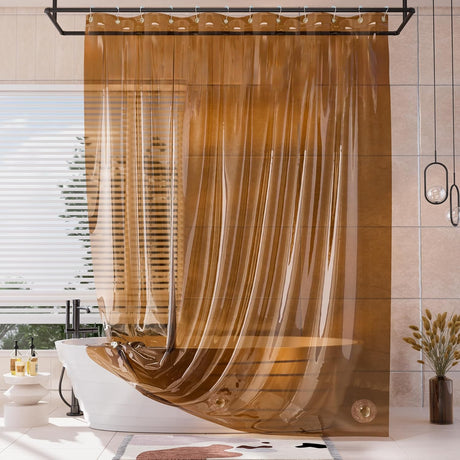 Amber translucent AmazerBath Sun EVA shower curtain liner installed around a white bathtub.