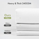 Material thickness detail of the Waffle Shower Curtain in shiny white.