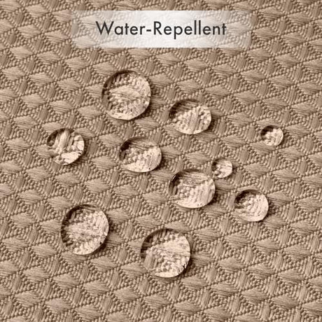 Water droplets beading on the water-repellent fabric of the AmazerBath taupe waffle shower curtain.