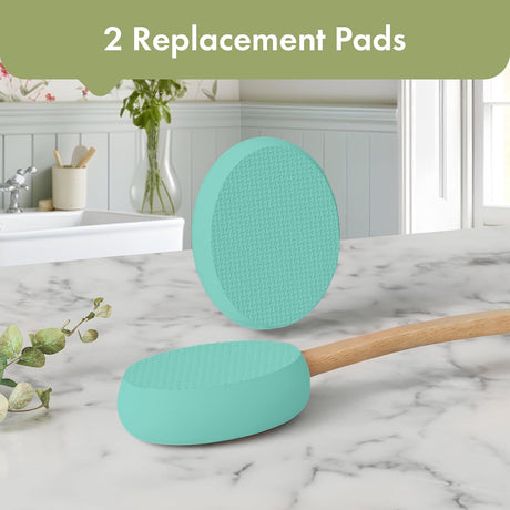 AmazerBath Lime back lotion applicator with two oval replacement pads displayed on a bathroom countertop.