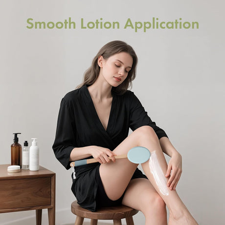 AmazerBath Sky Blue back lotion applicator used to spread lotion evenly across a woman's lower leg.