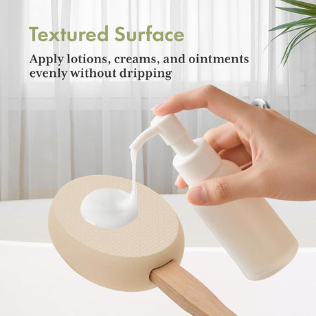AmazerBath Soft Beige back lotion applicator pad holding dispensed lotion on its textured surface without dripping.
