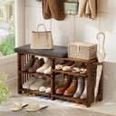 AmazerBath walnut bamboo shoe rack bench: the padded bench seat sits above three open shoe shelves in a bright entryway.