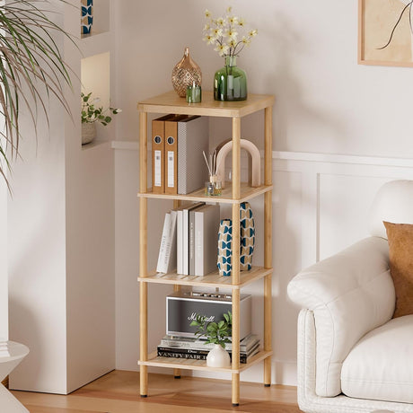 AmazerBath natural bamboo four-tier standing shelf used beside a sofa for books, framed art, flowers, and decor.
