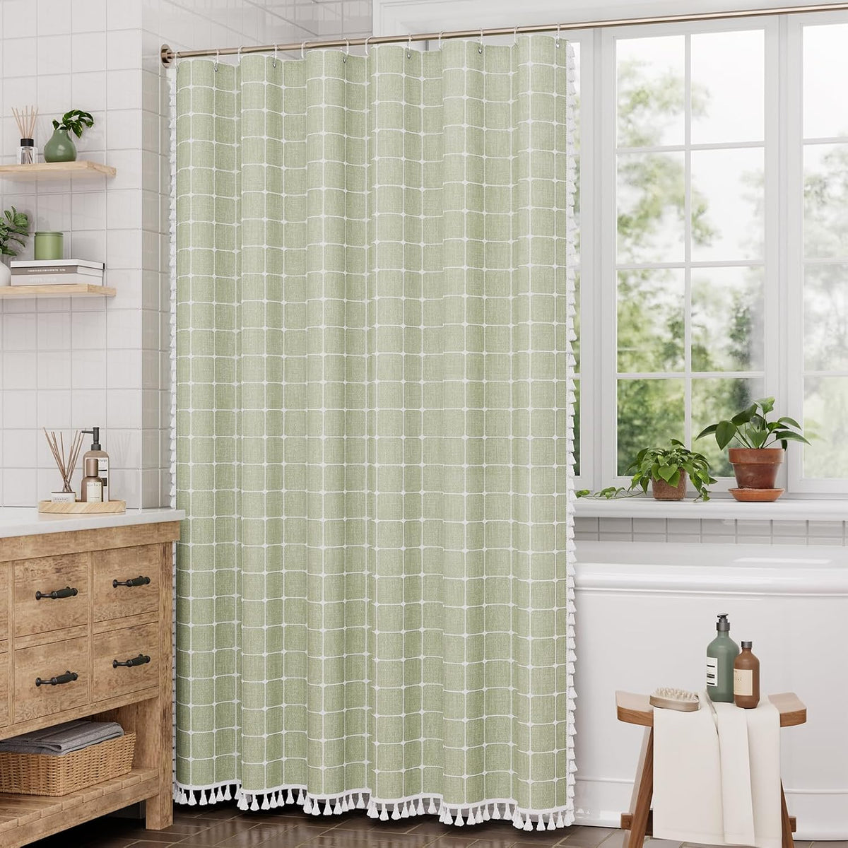 AmazerBath sage green grid linen curtain: the grid curtain hangs beside a bright window with its tassel hem visible.