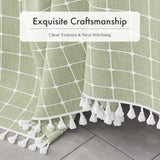 AmazerBath sage green grid linen curtain: twelve clear hooks hang from reinforced, rustproof metal grommets.