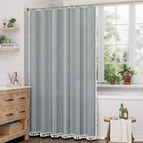 AmazerBath fog blue striped linen curtain: the striped curtain hangs beside a bright window with its tassel hem visible.