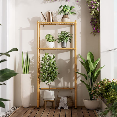 AmazerBath Natural bamboo two-tier over-the-toilet shelf used outdoors as a freestanding display for potted plants.