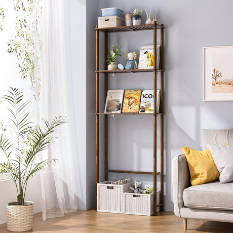 AmazerBath Walnut Brown bamboo three-tier over-the-toilet shelf styled beside a sofa with books, baskets, plants, and decor.