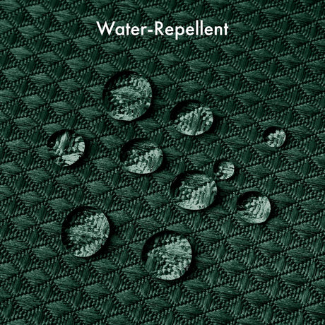 AmazerBath Dark Green waffle shower curtain with water droplets beading on the textured water-repellent fabric.