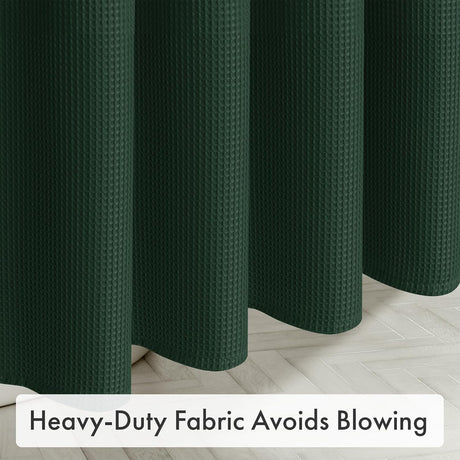 AmazerBath Dark Green waffle shower curtain with thick lower folds hanging steadily near the bathroom floor.