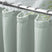 AmazerBath Grayish Green waffle shower curtain with a folded top hem, textured fabric, metal grommets, and hooks on a rod.