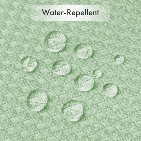 AmazerBath Mint Green waffle shower curtain with water droplets beading on the textured water-repellent fabric.