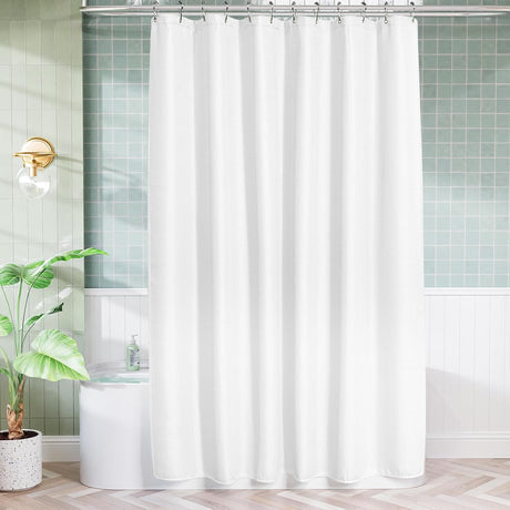 AmazerBath Shiny White extra-long waffle shower curtain in a 72 x 90-inch size, hanging nearly to the floor in a green-tile bathroom.