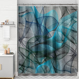A shower curtain with a gradient of gray shades, darker at the bottom and lighter at the top, hanging on a rod in a bathroom setting.